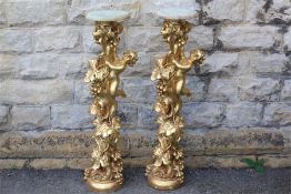 A Pair of Gilt-Effect Plant Stands