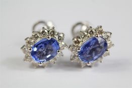 A Pair of 18ct White Gold Sapphire & Diamond Earrings