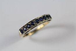 A Ladies 9ct Yellow Gold and Sapphire Ring