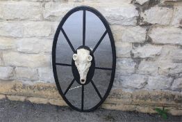 A Contemporary Oval Giraffe-Skull Mirror