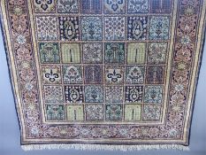 A Fine Silk Persian Carpet