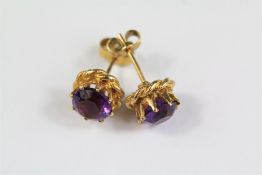A Pair of 9ct Yellow Gold Amethyst Earrings