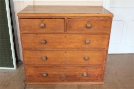 A Large Oak Chest of Drawers