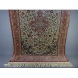 A Fine Silk Hereke Isfahan Carpet