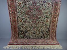 A Fine Silk Hereke Isfahan Carpet