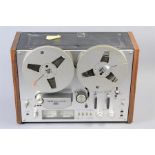 An Akai GX-4000D Reel to Reel Tape Deck.