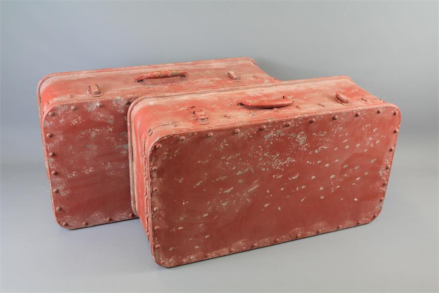 A Pair of Vintage-Style Red Metal Suitcases