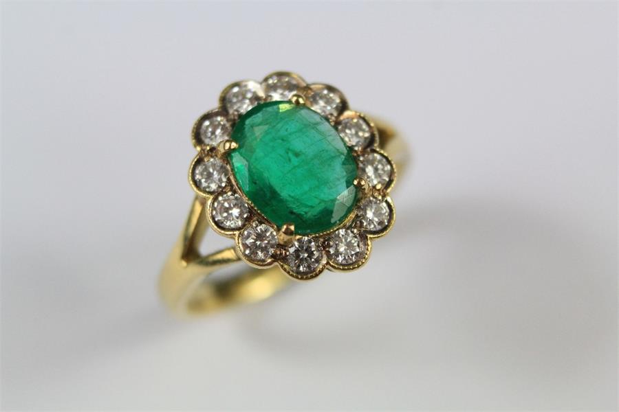 An 18ct Yellow Gold Emerald and Diamond Ring