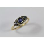 A Ladies Antique Yellow Gold Platinum Diamond and Sapphire Ring