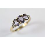 A 9ct Yellow Gold Lavender Topaz and Diamond Ring