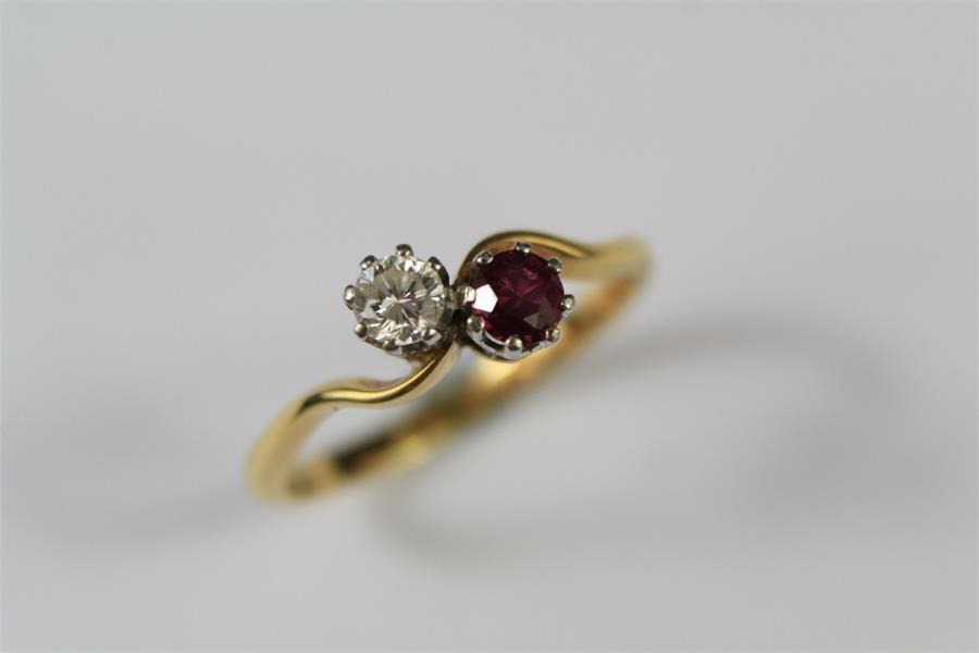 An 18ct Yellow Gold Diamond and Ruby Ring