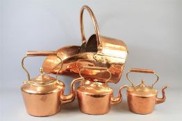 Three Graduated Fireside Copper Kettles