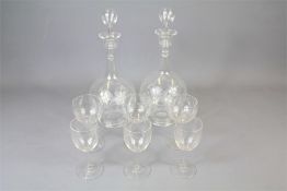 A Pair of Glass Decanters and Glasses