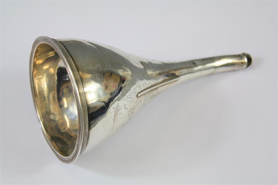 A Silver Georgian Wine Strainer