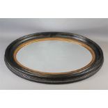 An Oval Bevelled Mirror