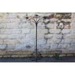 A Wrought Iron Candle Stand