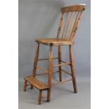 An Antique Oak Bar Chair