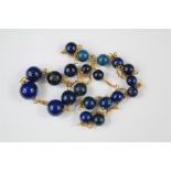 A 9ct Gold and Lapis Lazuli Necklace