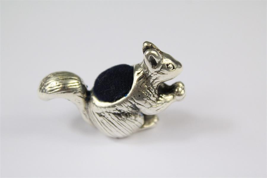 A Sterling Silver Squirrel Pin Cushion