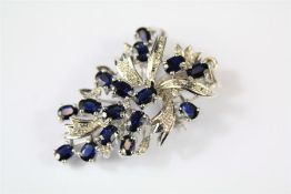 A White Gold Sapphire and Diamond Brooch