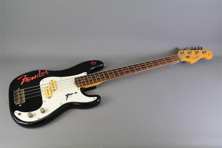 A Fender Precision Bass Guitar