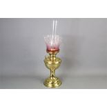 A Victorian Glass Oil Lamp
