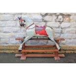 A Vintage Hand-Carved Wooden Rocking Horse