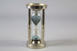 A French Napoleon Bonaparte Commemorative Hour Glass