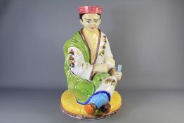 A Chinese Porcelain Figure