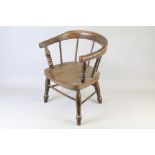 A Stained Oak Child's 'Smoking Chair'