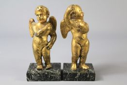 A Pair of Antique Italian Gilded Bronze Putti