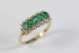 A Ladies 9ct Yellow Gold Emerald and Diamond Ring