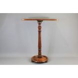 A Victorian Pedestal Wine Table