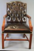 A Dark Brown Leather Studded Office Chair