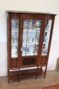 An Edwardian Curved Glass Display Cabinet