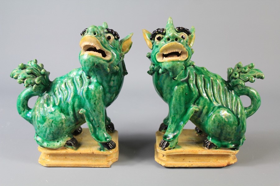 A Pair of Antique Emerald-Green Ceramic Foo Dog
