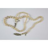 An Antique Graduated Cultured Pearl Necklace