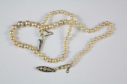 An Antique Graduated Cultured Pearl Necklace