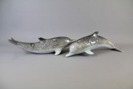 A Pair of Silver-Grey Glazed Porcelain Dolphins