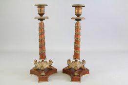 A Pair of French Walnut Gilt Brass Candlesticks