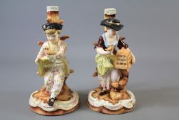 A Pair of Continental Porcelain Candlesticks.