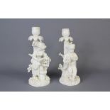 A Pair of Porcelain Figural Candlesticks