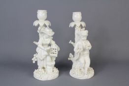 A Pair of Porcelain Figural Candlesticks