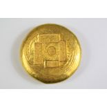 A Chinese Gilt Metal Trade Token