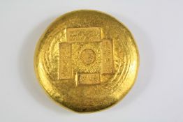 A Chinese Gilt Metal Trade Token