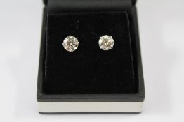 A Pair of White Gold Diamond Stud Earrings