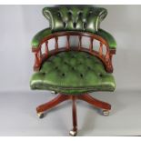 A Green Leather Captain's Chair