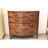 A Bow-Fronted Flame Mahogany Chest of Drawers