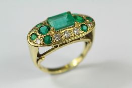 A Lady's Bespoke 18ct Yellow Gold Emerald and Diamond Ring