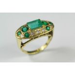 A Lady's Bespoke 18ct Yellow Gold Emerald and Diamond Ring